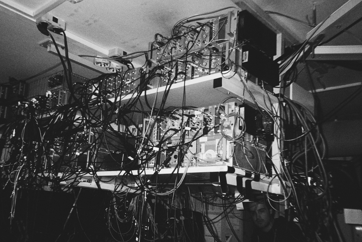 Black and white picture of computers and cables